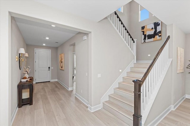 940 Lindbergh Dr, San Marcos, CA 92069 - foyer featuring light wood-style floors, stairs, and recessed lighting
