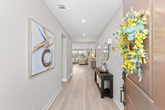 940 Lindbergh Dr, San Marcos, CA 92069 - hallway with light wood finished floors and recessed lighting