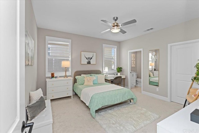 940 Lindbergh Dr, San Marcos, CA 92069 - bedroom with light carpet, ensuite bathroom, and a ceiling fan