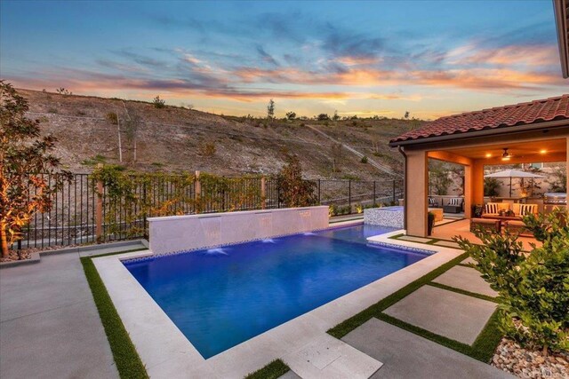 940 Lindbergh Dr, San Marcos, CA 92069 - view of pool featuring a fenced backyard, a patio area, and an outdoor living space