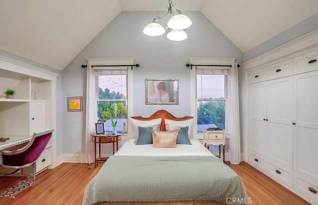 1151 W 14th St, San Pedro, CA 90731 - bedroom featuring vaulted ceiling, light wood-style flooring, and multiple windows
