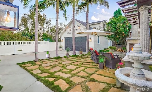 1151 W 14th St, San Pedro, CA 90731 - view of yard with a garage, a patio, and an outbuilding