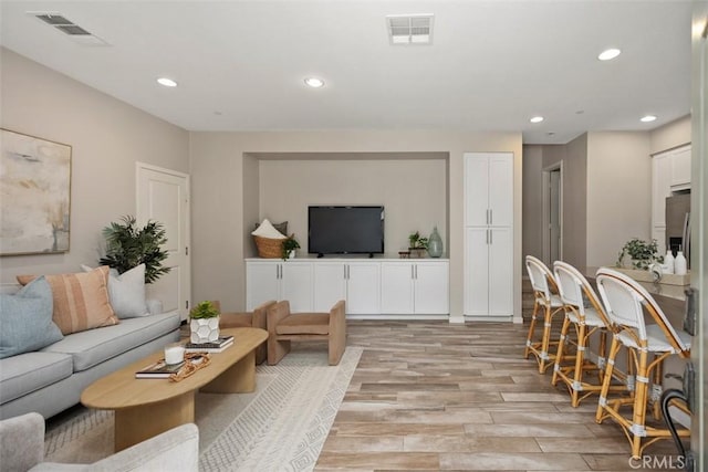 16 Abarrota St, Rancho Mission Viejo, CA 92694 - living room featuring light wood finished floors and recessed lighting