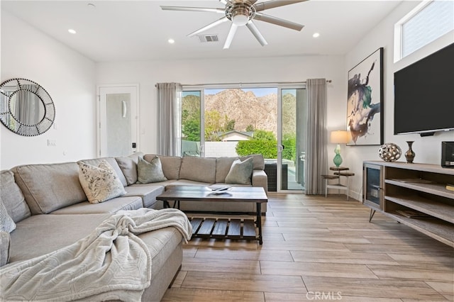 54060 Avenida Madero Ln, Quinta, CA 92253 - living room with ceiling fan, light wood finished floors, and recessed lighting