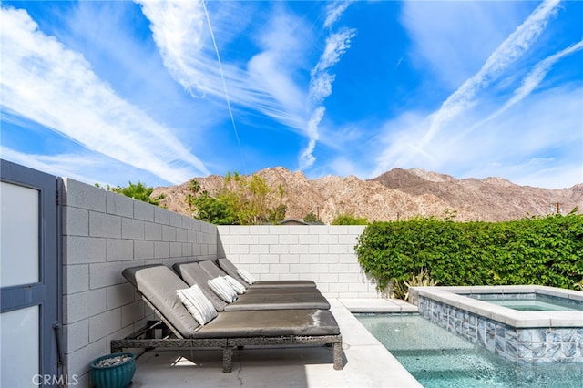 54060 Avenida Madero Ln, Quinta, CA 92253 - view of patio with a mountain view and a pool with connected hot tub