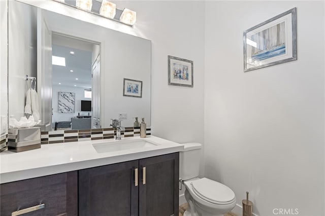 54060 Avenida Madero Ln, Quinta, CA 92253 - half bath featuring vanity, toilet, and recessed lighting