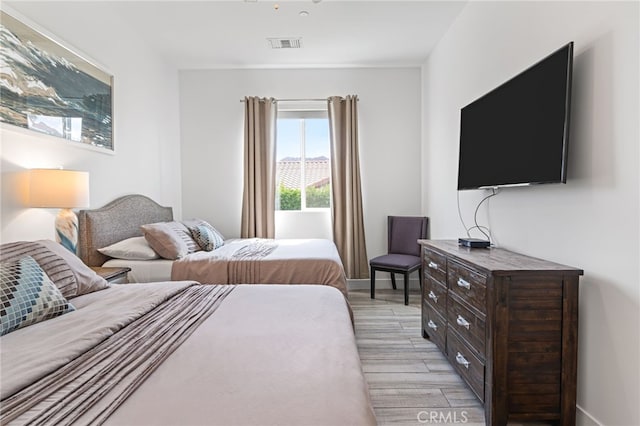 54060 Avenida Madero Ln, Quinta, CA 92253 - bedroom with light wood-type flooring and baseboards