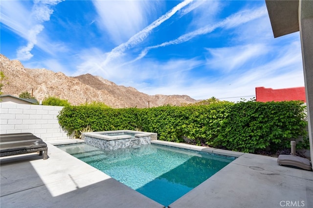 54060 Avenida Madero Ln, Quinta, CA 92253 - view of swimming pool featuring a mountain view, a patio area, and a pool with connected hot tub