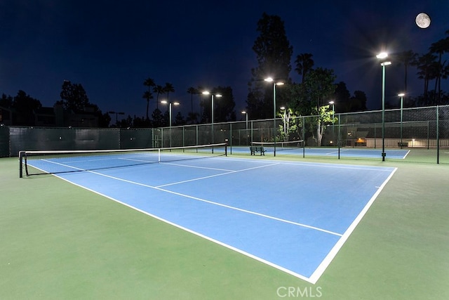 5530 Owensmoutth Ave Unit 306, Woodland Hills, CA 91367 - view of tennis court with fence