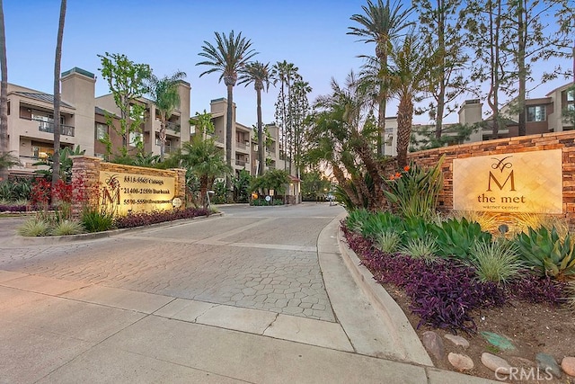 5530 Owensmoutth Ave Unit 306, Woodland Hills, CA 91367 - community sign featuring a residential view