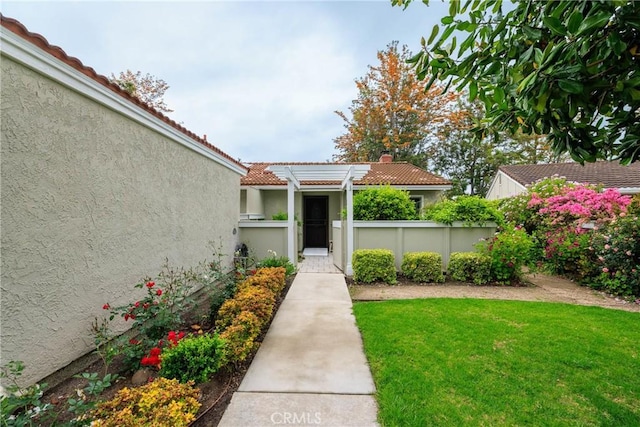 3268 San Amadeo Unit C, Laguna Woods, CA 92637 - entrance to property featuring stucco siding and a tiled roof