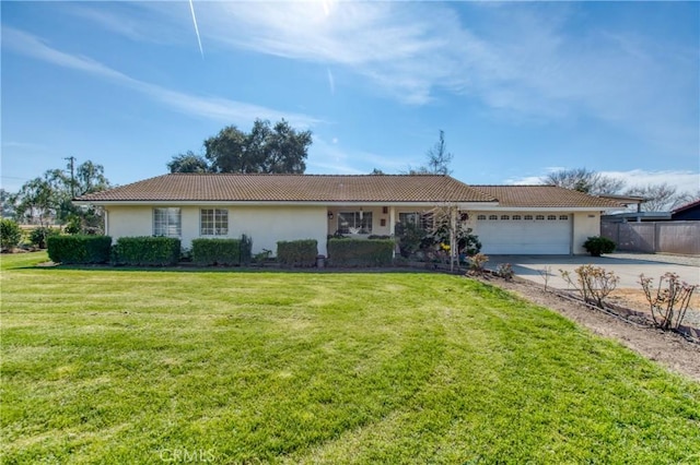 single story home with a tiled roof, stucco siding, concrete driveway, and an attached garage
