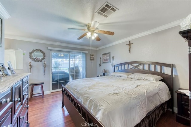 bedroom with dark wood-style flooring, crown molding, access to exterior, baseboards, and ceiling fan