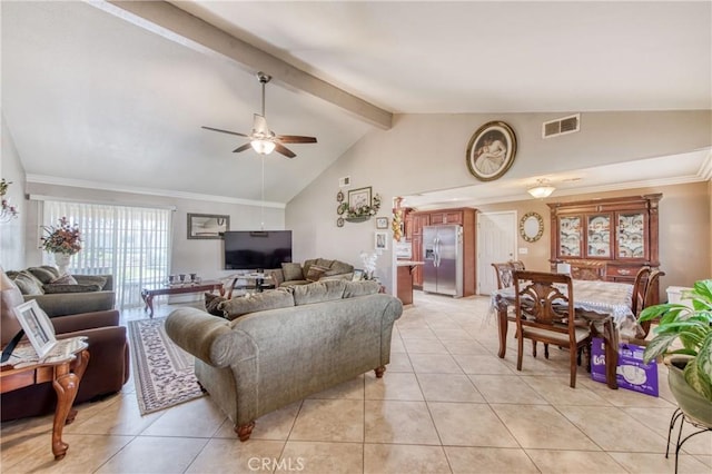 living room with a ceiling fan, light tile patterned floors, beam ceiling, and high vaulted ceiling