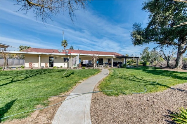 view of community featuring a lawn