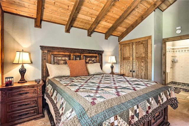 bedroom featuring wooden ceiling, carpet, and ensuite bathroom