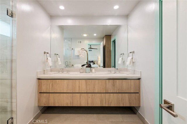 225 S Guadalupe Ave, Redondo Beach, CA 90277 - bathroom featuring a shower stall, double vanity, tile patterned floors, baseboards, and recessed lighting