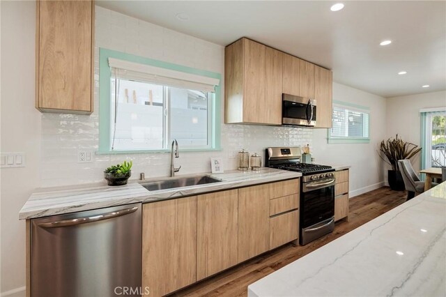 225 S Guadalupe Ave, Redondo Beach, CA 90277 - kitchen featuring stainless steel appliances, a sink, light brown cabinetry, wood finished floors, and recessed lighting
