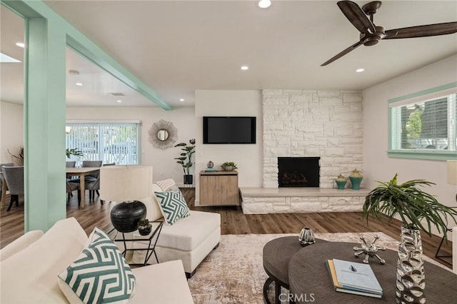225 S Guadalupe Ave, Redondo Beach, CA 90277 - living area with wood finished floors, a ceiling fan, a stone fireplace, and recessed lighting