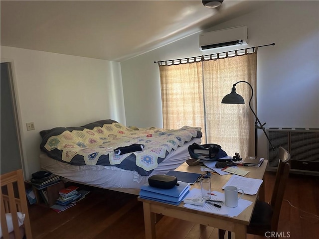 30 Bear Dr, Mt Baldy, CA 91759 - bedroom with wood finished floors, a wall mounted AC, vaulted ceiling, and a desk