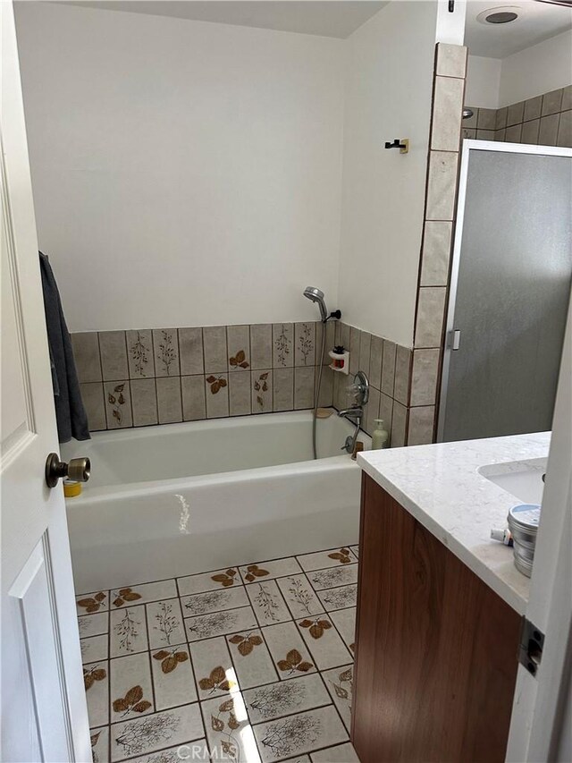 30 Bear Dr, Mt Baldy, CA 91759 - full bathroom with vanity, a garden tub, a stall shower, and tile patterned flooring