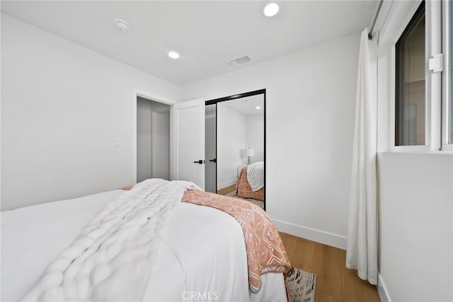 3241 Dalemead St, Torrance, CA 90505 - bedroom with wood finished floors, recessed lighting, a closet, and baseboards