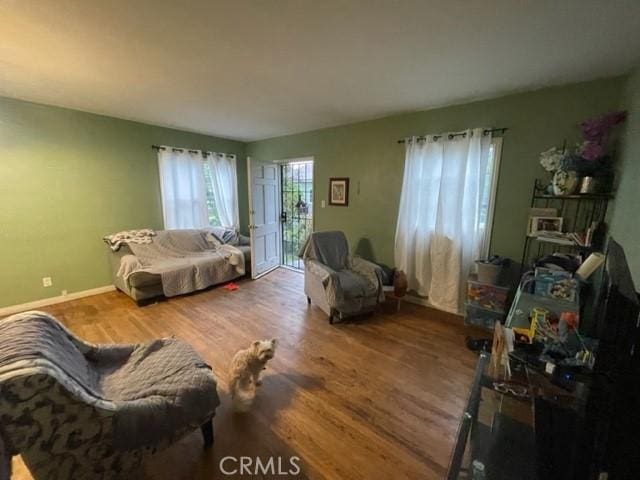 6705 Denny Ave, North Hollywood, CA 91606 - living area featuring wood finished floors and baseboards