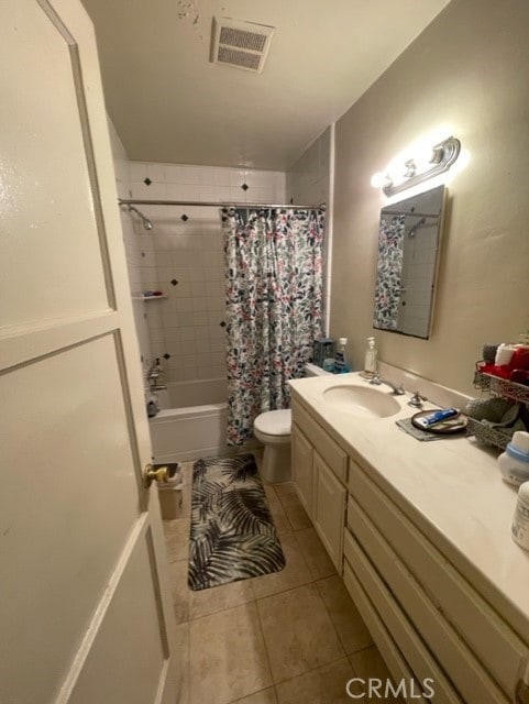 6705 Denny Ave, North Hollywood, CA 91606 - full bathroom featuring tile patterned flooring, toilet, vanity, and shower / bath combination with curtain