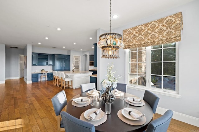 3401 Adams Run, Encinitas, CA 92024 - dining area featuring baseboards, a chandelier, wood finished floors, and recessed lighting