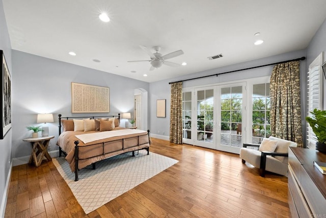 3401 Adams Run, Encinitas, CA 92024 - bedroom featuring access to outside, arched walkways, baseboards, recessed lighting, and light wood-style flooring