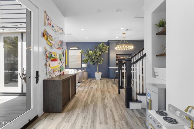 4173 Caribbean St, Oxnard, CA 93035 - corridor with light wood-style flooring, stairway, recessed lighting, a chandelier, and healthy amount of natural light