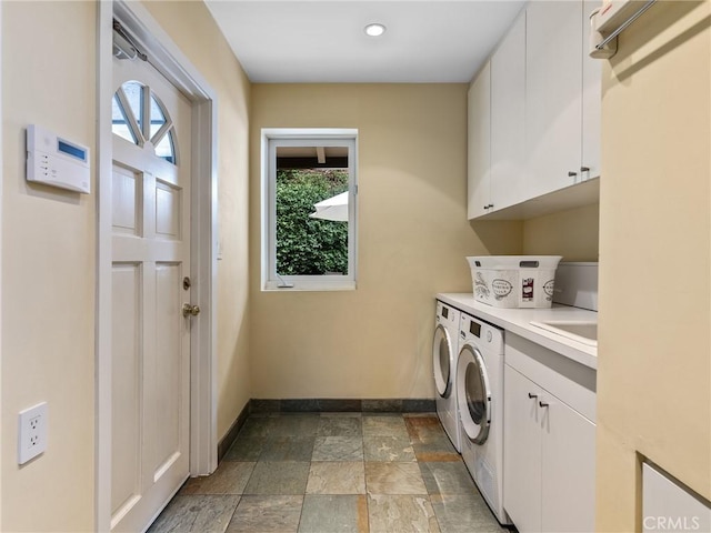 3818 Hollyline Ave, Sherman Oaks, CA 91423 - laundry area with cabinet space, independent washer and dryer, baseboards, stone finish flooring, and recessed lighting