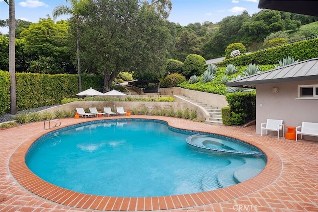 3818 Hollyline Ave, Sherman Oaks, CA 91423 - view of pool featuring stairs, a patio, and a pool with connected hot tub