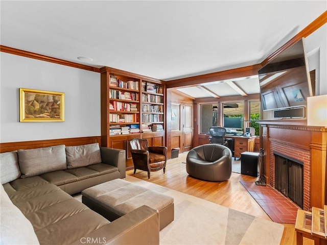 3818 Hollyline Ave, Sherman Oaks, CA 91423 - living area featuring a brick fireplace, wood finished floors, ornamental molding, and beamed ceiling