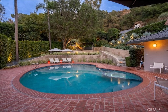 3818 Hollyline Ave, Sherman Oaks, CA 91423 - view of swimming pool featuring stairs, a patio, a pool with connected hot tub, and fence