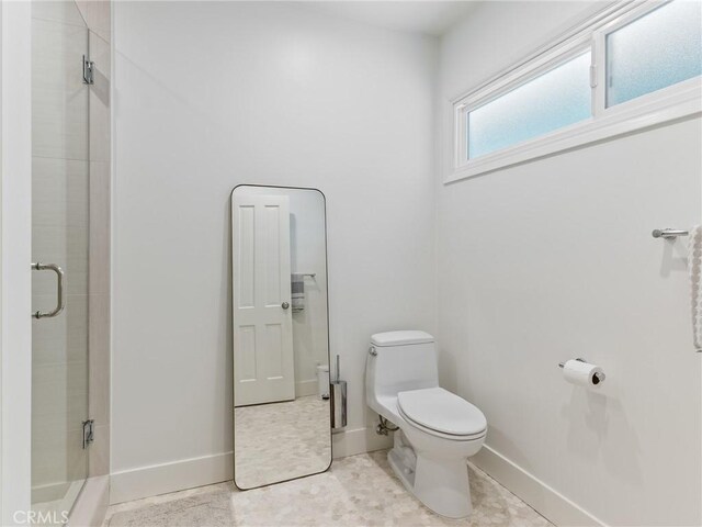 3818 Hollyline Ave, Sherman Oaks, CA 91423 - bathroom with toilet, tiled shower, baseboards, and tile patterned floors