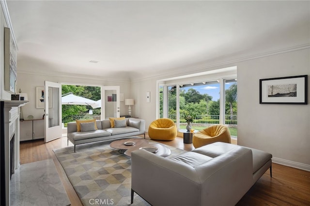 3818 Hollyline Ave, Sherman Oaks, CA 91423 - living room with wood finished floors, a fireplace with flush hearth, crown molding, and baseboards