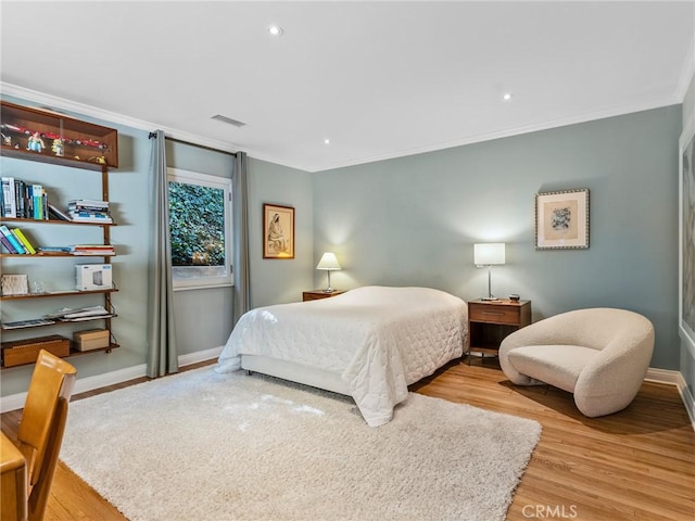 3818 Hollyline Ave, Sherman Oaks, CA 91423 - bedroom with wood finished floors, baseboards, crown molding, and recessed lighting