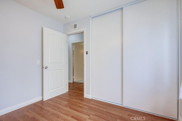 25681 Westover Cir, Lake Forest, CA 92630 - unfurnished bedroom with light wood finished floors, a closet, baseboards, and ceiling fan