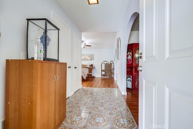 25681 Westover Cir, Lake Forest, CA 92630 - corridor with arched walkways and wood finished floors