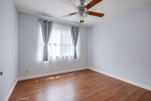 25681 Westover Cir, Lake Forest, CA 92630 - empty room with wood finished floors, ceiling fan, and baseboards