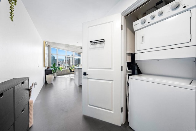 1080 Park Blvd Unit 701, San Diego, CA 92101 - washroom with stacked washer / drying machine and a city view