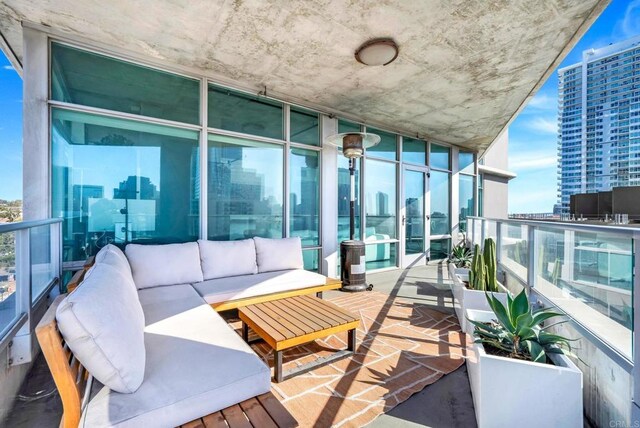 1080 Park Blvd Unit 701, San Diego, CA 92101 - balcony with outdoor lounge area and a city view