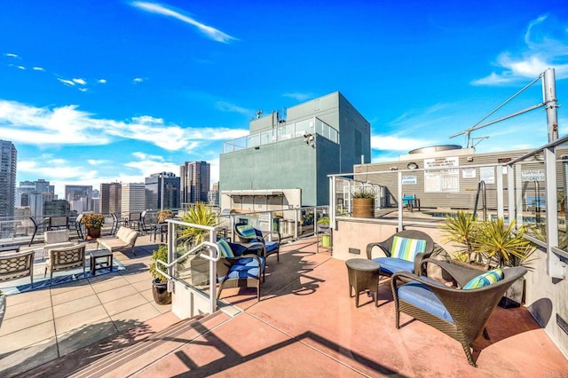 1080 Park Blvd Unit 701, San Diego, CA 92101 - view of patio / terrace with a skyline view and an outdoor fire pit