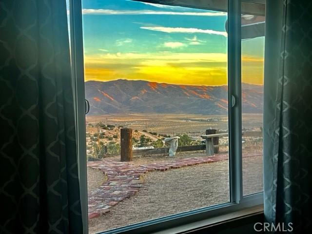 25624 Castlerock Rd, Apple Valley, CA 92308 - doorway featuring a mountain view