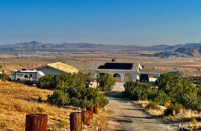25624 Castlerock Rd, Apple Valley, CA 92308 - view of mountain backdrop with rural landscape