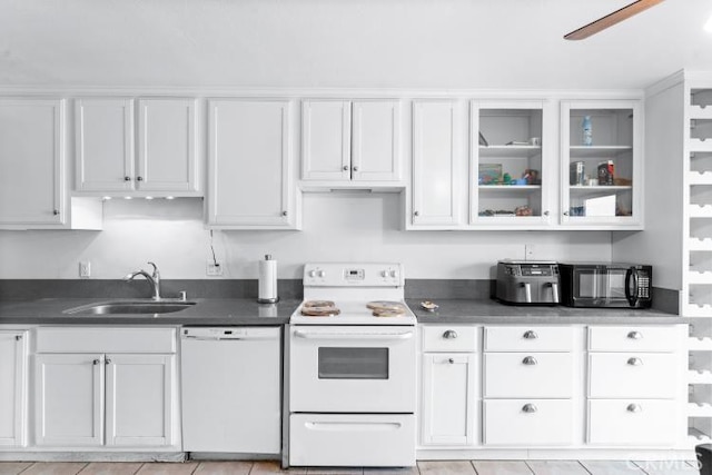 1800 E Heim Ave Unit 2, Orange, CA 92865 - kitchen featuring white appliances, a sink, white cabinetry, and glass insert cabinets
