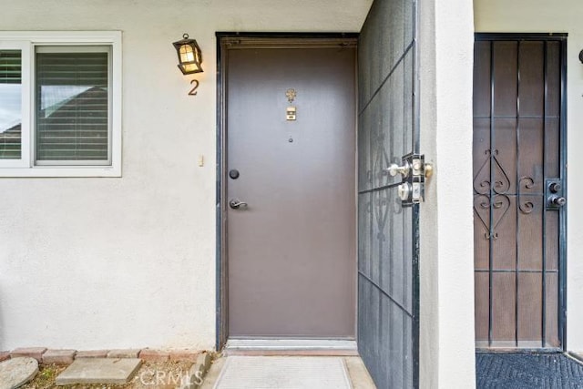 1800 E Heim Ave Unit 2, Orange, CA 92865 - view of exterior entry featuring stucco siding