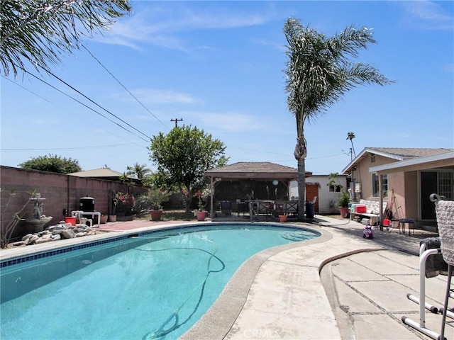 10922 Vickers Dr, Garden Grove, CA 92840 - view of pool with a fenced backyard, a patio, and a gazebo