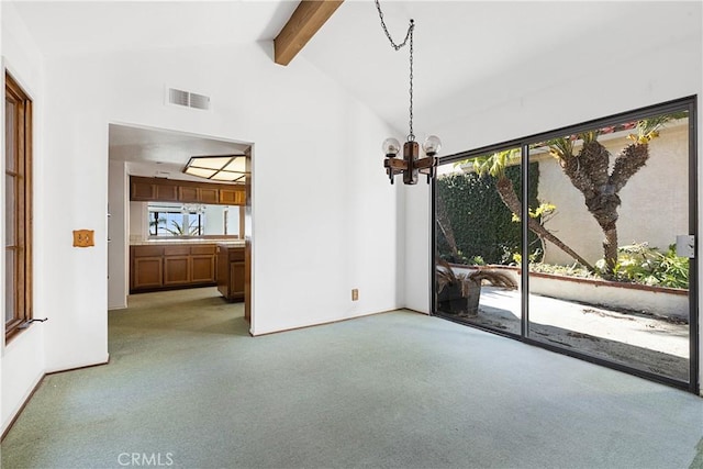 537 Avenida Buenos Aires, San Clemente, CA 92672 - unfurnished dining area featuring carpet floors, beam ceiling, a chandelier, and high vaulted ceiling